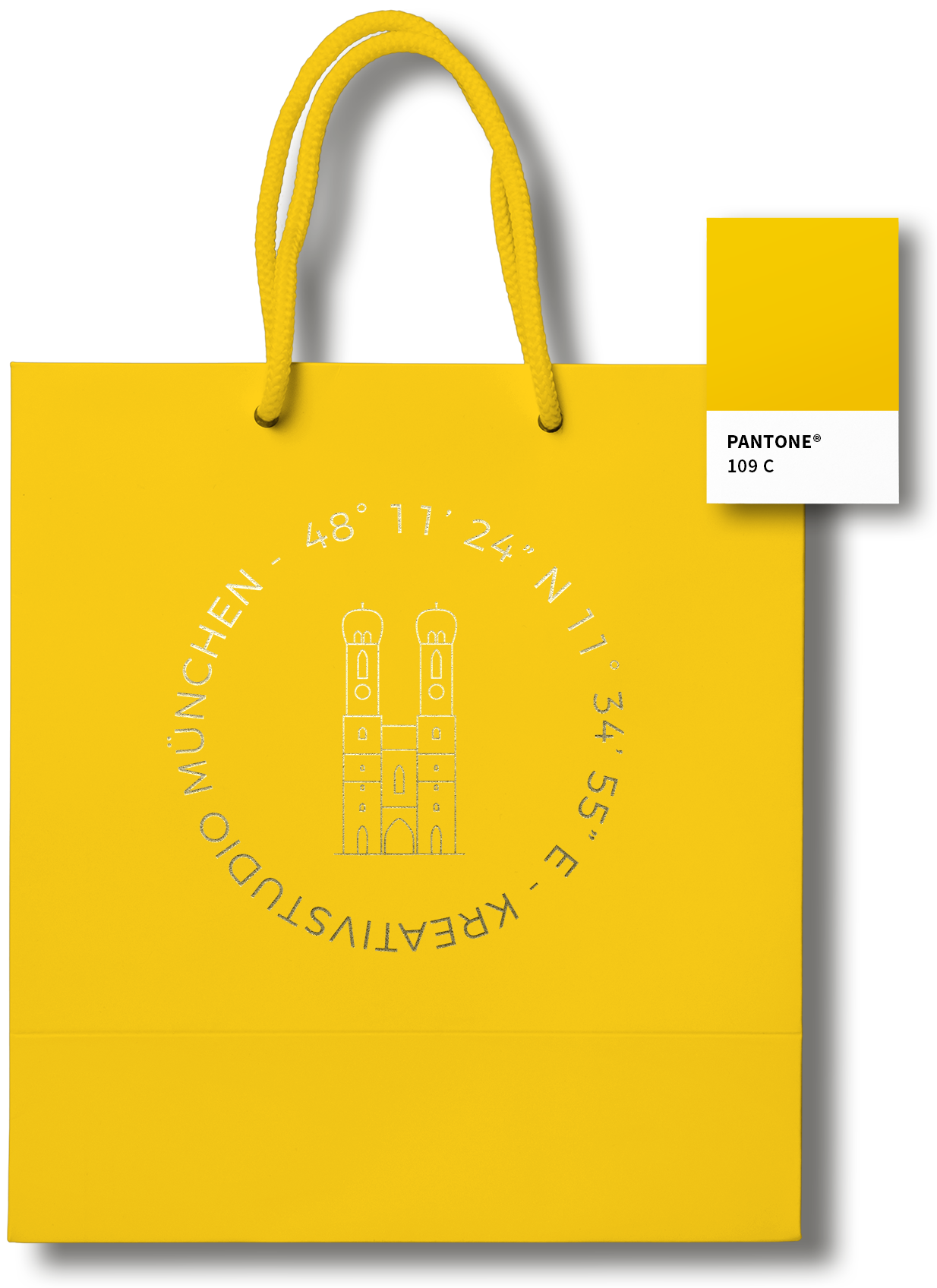 Gelbe Papiertüte mit Branding des KREATIVSTUDIO München und Pantone Farblabel in WissensMANUFAKTUR Gelb Pantone 109C